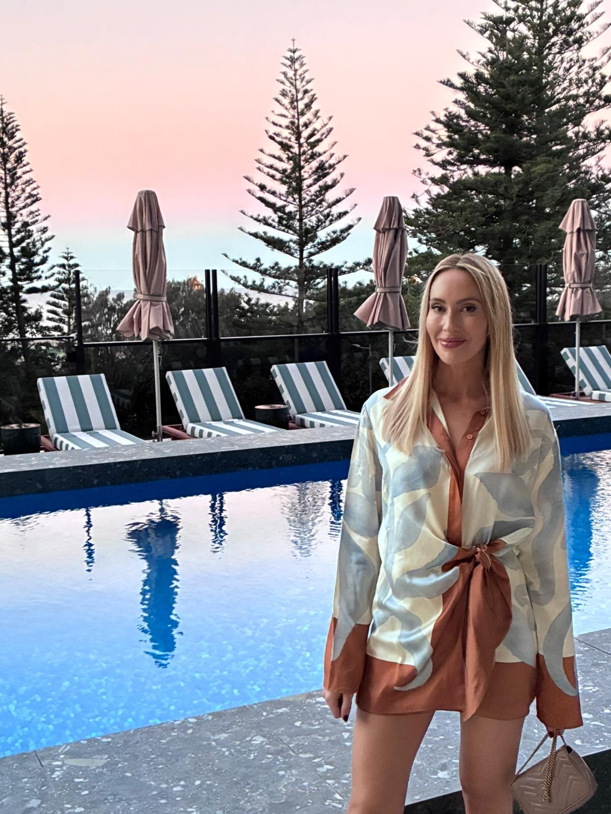 Liz Tilley poolside at sunset